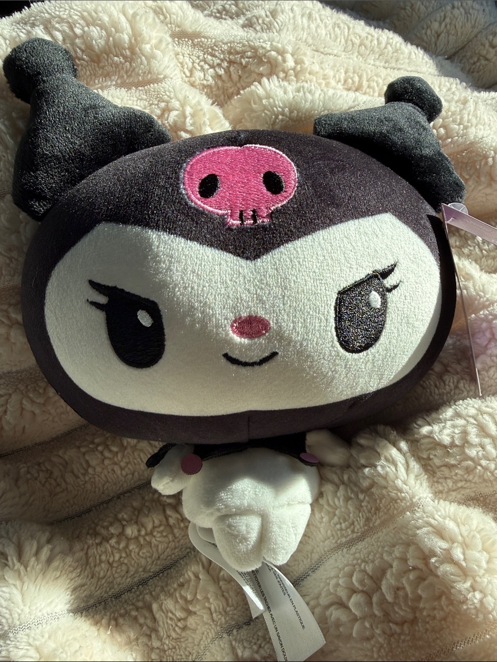 Black and White Plush Character Toy with Pink Skull Accent